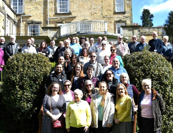 mustard seed community - large group of people gathered outside wydale hall.