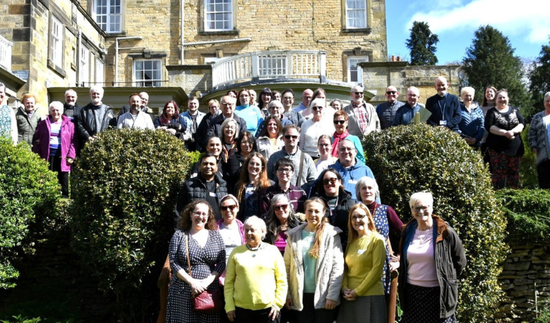 mustard seed community - large group of people gathered outside wydale hall.