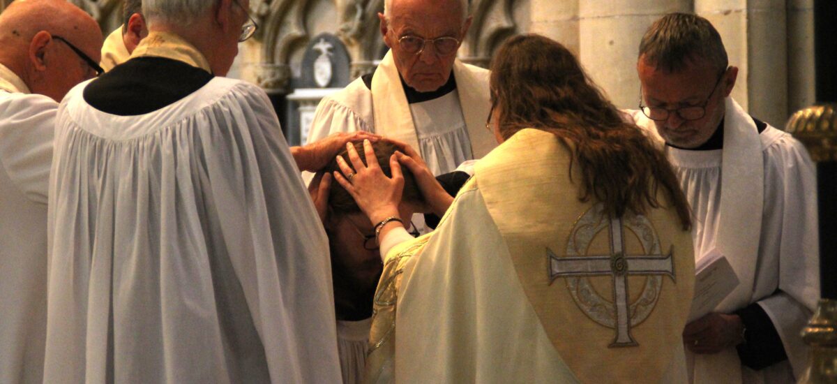 bishop ordaining priest