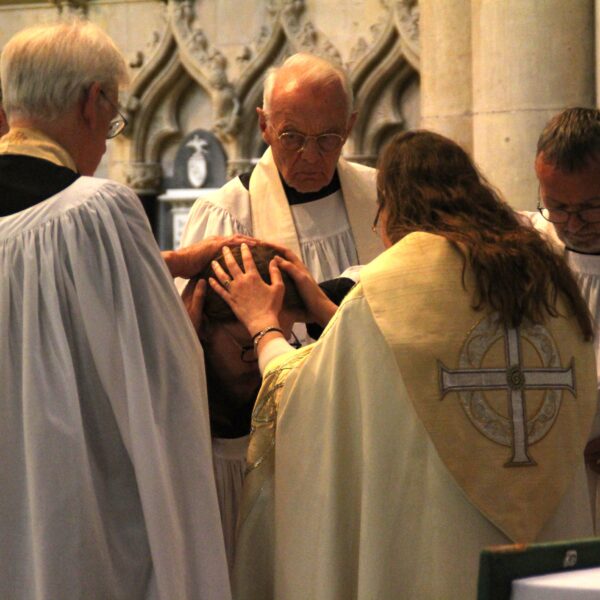 bishop ordaining priest