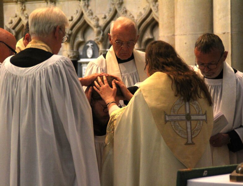 bishop ordaining priest