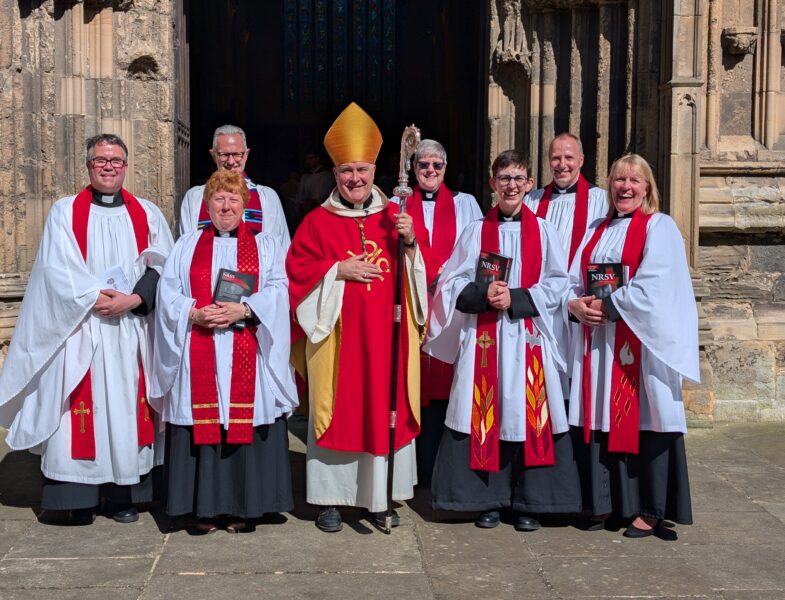 the archbishop of york and new priests outside bridlington priory