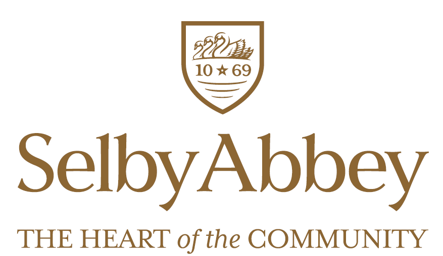 selby abbey logo, text reads 'selby abbey. the heart of the community'