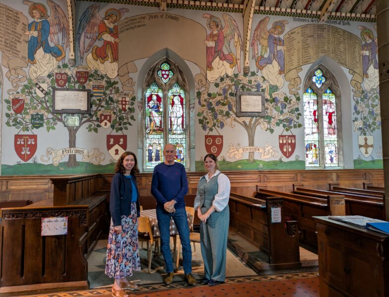 group standing inside church