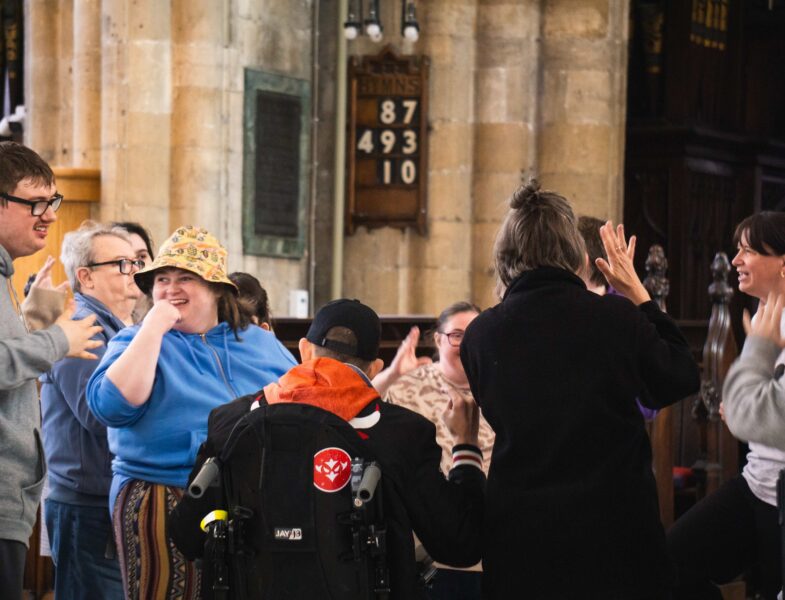 A group of disabled young adults take part in a dance session at Hull Minster